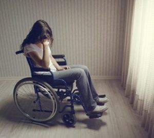 Crying-Woman-Sitting-In-Wheelchair