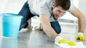man-cleaning-floor