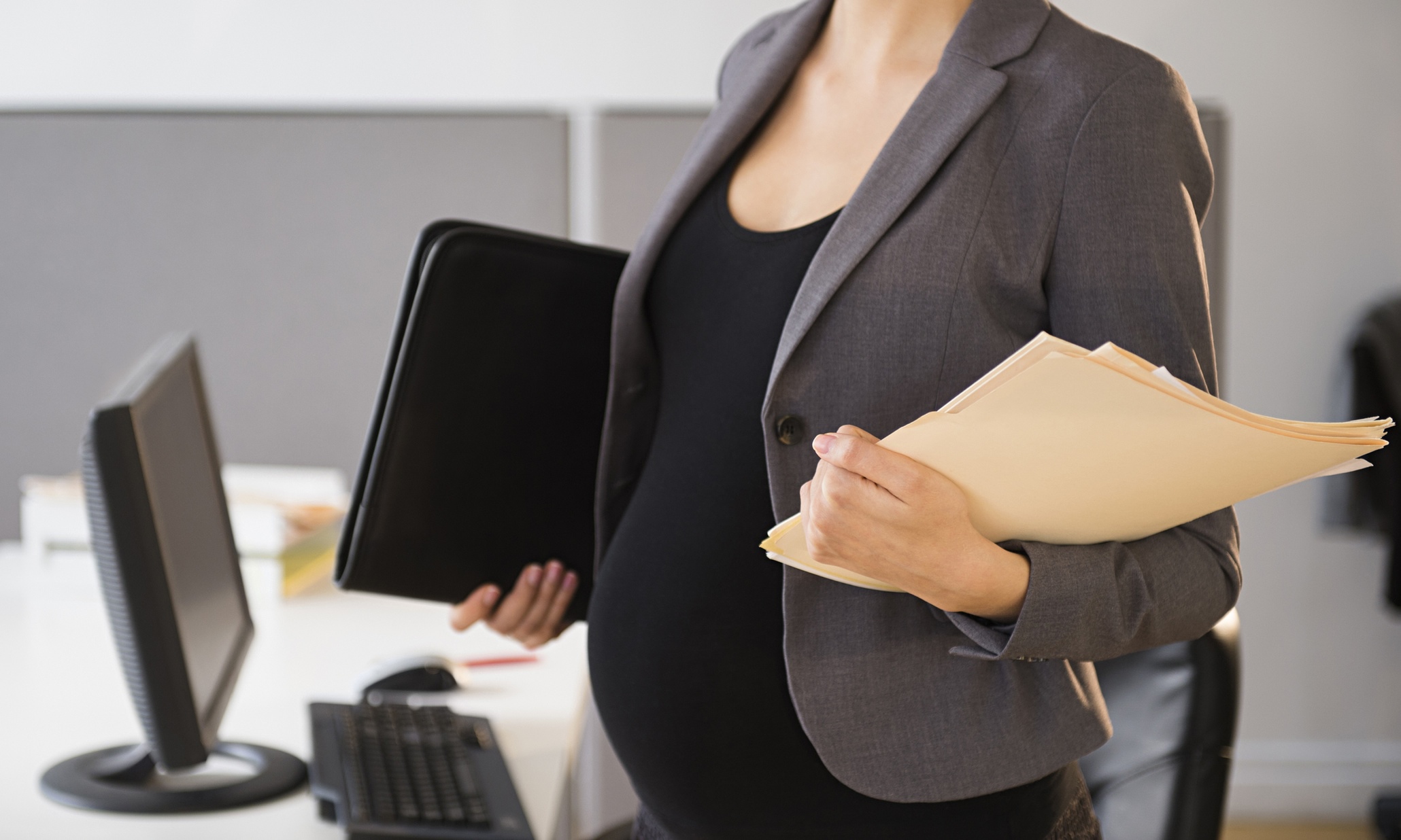 Pregnant woman in an office