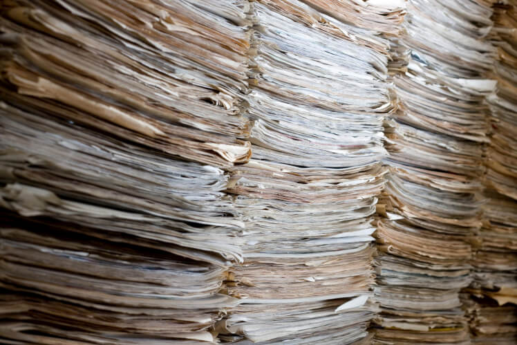 old-newspapers-stacked-md